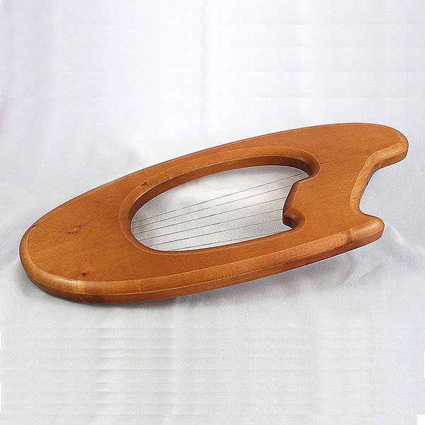 The Hummingbird pentatonic harp's edges have been rounded, furthering the organic shape concept